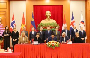 General Secretary and President To Lam (6th from left, back row) witnesses the signing ceremony of the free trade agreement between Viet Nam and the European Free Trade Association member countries, Ha Noi, October 18, 2026. Photo: VGP